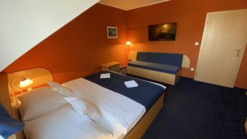 Dvoulůžkový pokoj Deluxe | Hotel U Milína